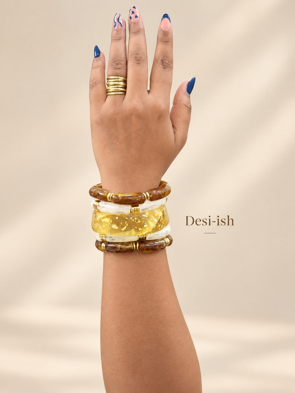 Desi-ish honey gold resin statement bangle stack of 5 styled on hand