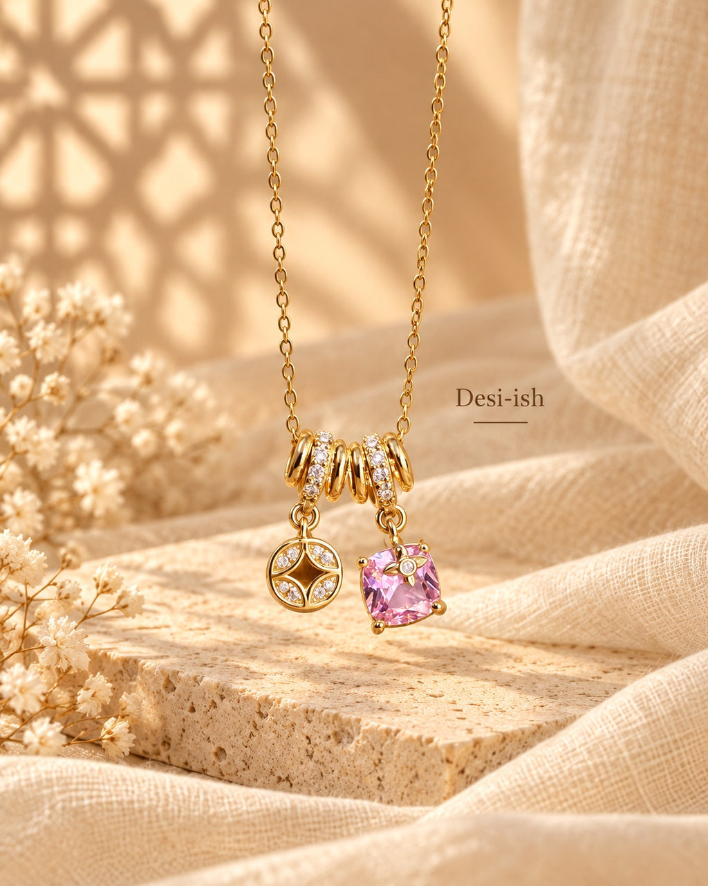 Desi-ish Pink Spark Charm Necklace flat lay