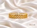 Quatrefoil crystal gold-tone kada on white satin, cover image