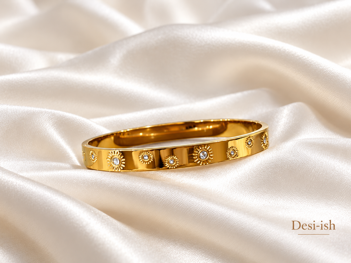 Sunburst crystal kada on white satin, angled view
